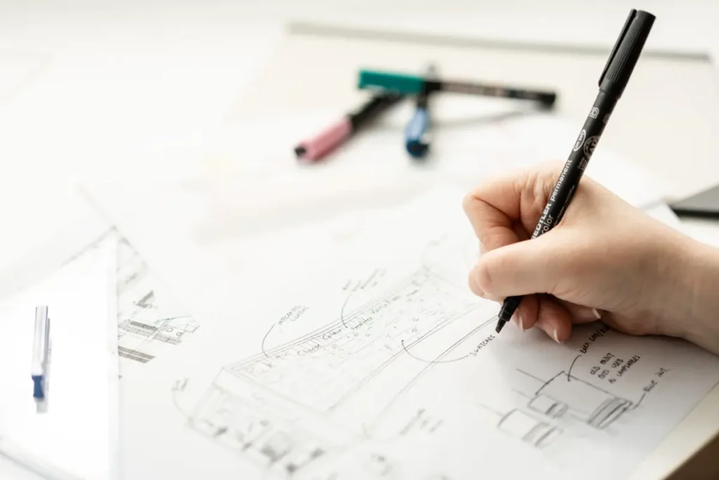 Elisa sketching for a shop